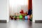 Childrenâ€™s multicolored toys on wooden floor or carpet on kids room