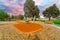 Childrenâ€™s park playground in Suburban Melbourne Victoria Australia. Lovely green grass and nice sunset colours in the sky