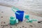 Childs green beach bucket and spades