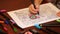 Childs hand painting anti stress colouring with colored felt pens