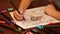 Childs hand painting anti stress colouring with colored felt pens