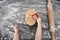 Childs hands making shortbread cookies on table with flour. Heart shaped cookie .Top view