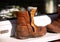 Childs leather boots drying on sunny window sill