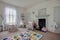 Childs nursery room with alphabet rug