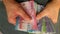 Chile currency various banknotes converted in hands