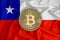 Chile flag, bitcoin gold coin on flag background. The concept of blockchain, bitcoin, currency decentralization in the country. 3d