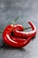 Chili pepper on a black stone background