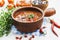 Chili soup with red beans and greens