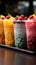 Chilled delight, row of icy fruit slushies, each in a plastic cup