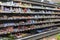 Chilled food shelves in a supermarket. Big choice. Blurred