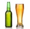 Chilled green bottle with condensate and a glass of beer lager