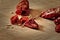 Chilli seeds and sliced chilli pods on a chopping