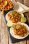 Chilorio is a scrumptious northern Mexican dish made with shredded pork simmered in a delicious chili sauce with spices closeup in