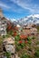 Chimgan mountains, Uzbekistan, amazing nature landscape with rocks, tulip flowers and blue sky, travel background