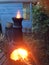 Chiminea fire burning in a backyard