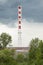 The chimney of a gas boiler house for heating residential buildings in the city. The chimney is an atmospheric pollutant.