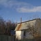 Chimney and  partly damaged roof