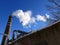 Chimney smoke with blue sky