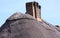 Chimney stack on thatch roof