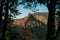 Chimney Tops Framed By Large Trees