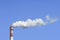 Chimney with withe Smokestack against a blue sky, Beijing, China