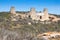 Chimneys of dwelling houses built into mount. Chinchilla