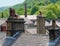 Chimneys and roofs of traditional stone built houses and mills typical of yorkshire small towns and villages