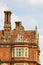 The chimneys and rooftop of a Tudor building, England.