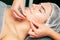 Chin massage of young woman