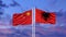 China and Albania two flags on flagpoles and blue cloudy sky.