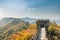 China The great wall distant view compressed towers and wall segments autumn season in mountains near Beijing ancient chinese for
