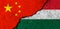 China and Hungary. Flags background. Concept of politics, economy, culture and conflicts, war. Friendships and