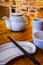 China local Restaurant Table Setting with Chopsticks, Plate,Teapot and Bowl.