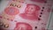 China money Yuan banknotes printing out from money press.