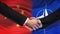China and NATO handshake, international friendship relations, flag background