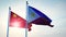 China and Philippines flags showing cooperation  or conflict