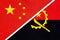 China or PRC vs Angola national flag from textile. Relationship between Asian and African countries