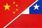 China or PRC vs Chile national flag from textile. Relationship between asian and american countries