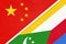 China or PRC vs Union of the Comoros national flag from textile. Relationship between Asian and African countries