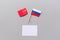 China-Russia relations. Country cooperation. Russian and Chinese flags on white background top view copy space. Flat lay