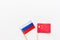 China-Russia relations. Country cooperation. Russian and Chinese flags on white background top view copy space. Flat lay, overhead