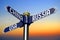 China, Russia, USA - signpost with three arrows, sunset sky