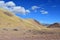 China, the structure of the Tibetan mountains on the way to lake Mershung in summer in clear weather