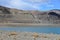 China, Tibet.Nature-created image of Buddha`s eyes on the mountain on the shore of holy lake Chovo Co 4765 m in summer day