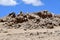 China, Tibet. Summer mountain landscape. Scattering of stones