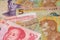 China Yuan Renminbi currency and New Zealand Dollar banknotes.
