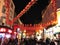Chinatown, London at night with crowd of people