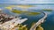 Chincoteague bridge across the Chincoteague Bay in Virginia and views of the waterfront. Drone view