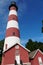 Chincoteague, Virginia U.S.A - September 21, 2021 - The red and white tower of Assateague Light House during the day