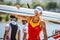 Chinese athlete on a World Rowing Cup Competition carries a boat